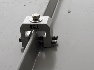 Alternate view of a clamp-mounted bar snow retention system on standing seam roofing