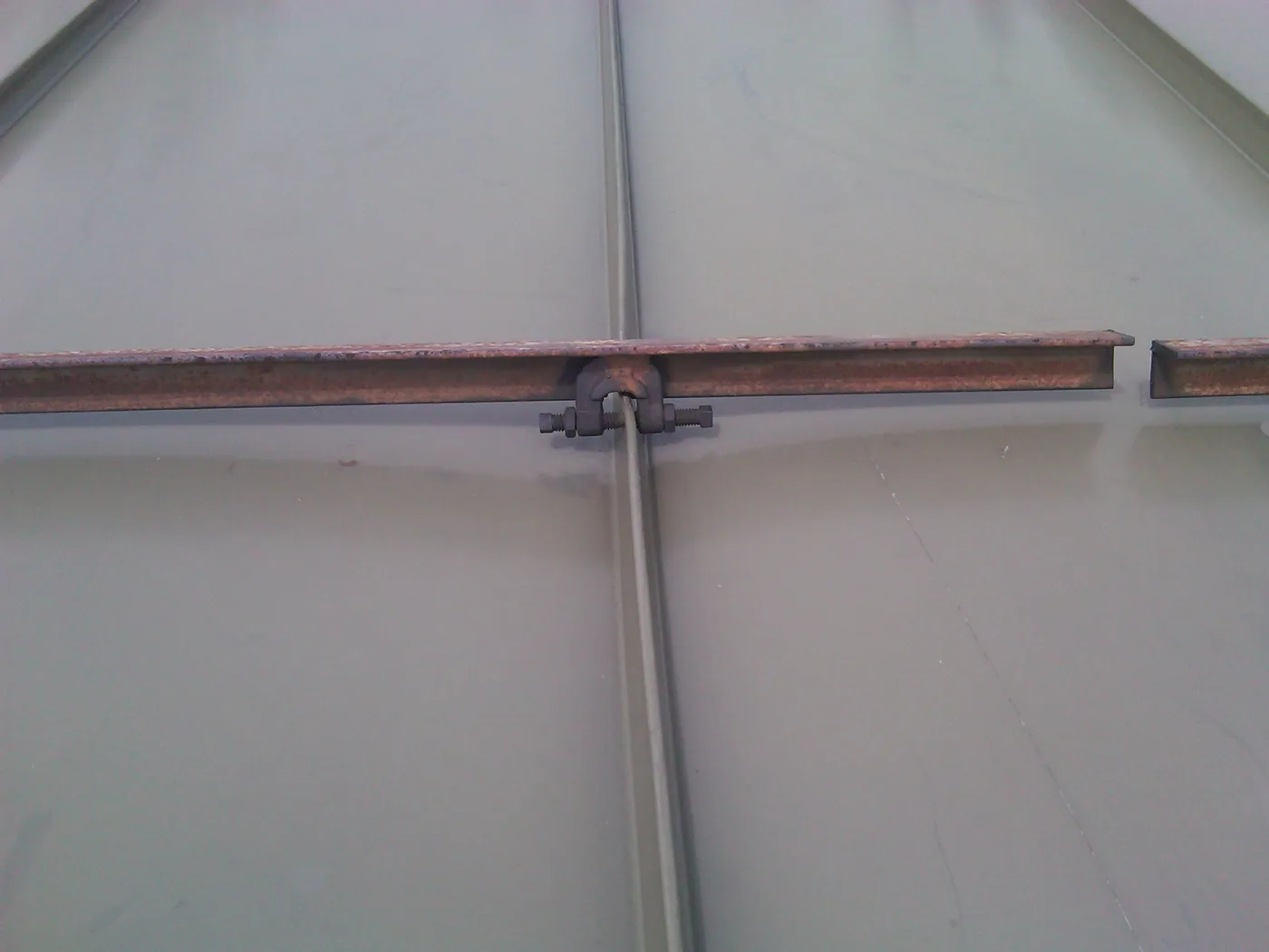 Universal-fit roof clamp design developed to fit a wider range of standing seams