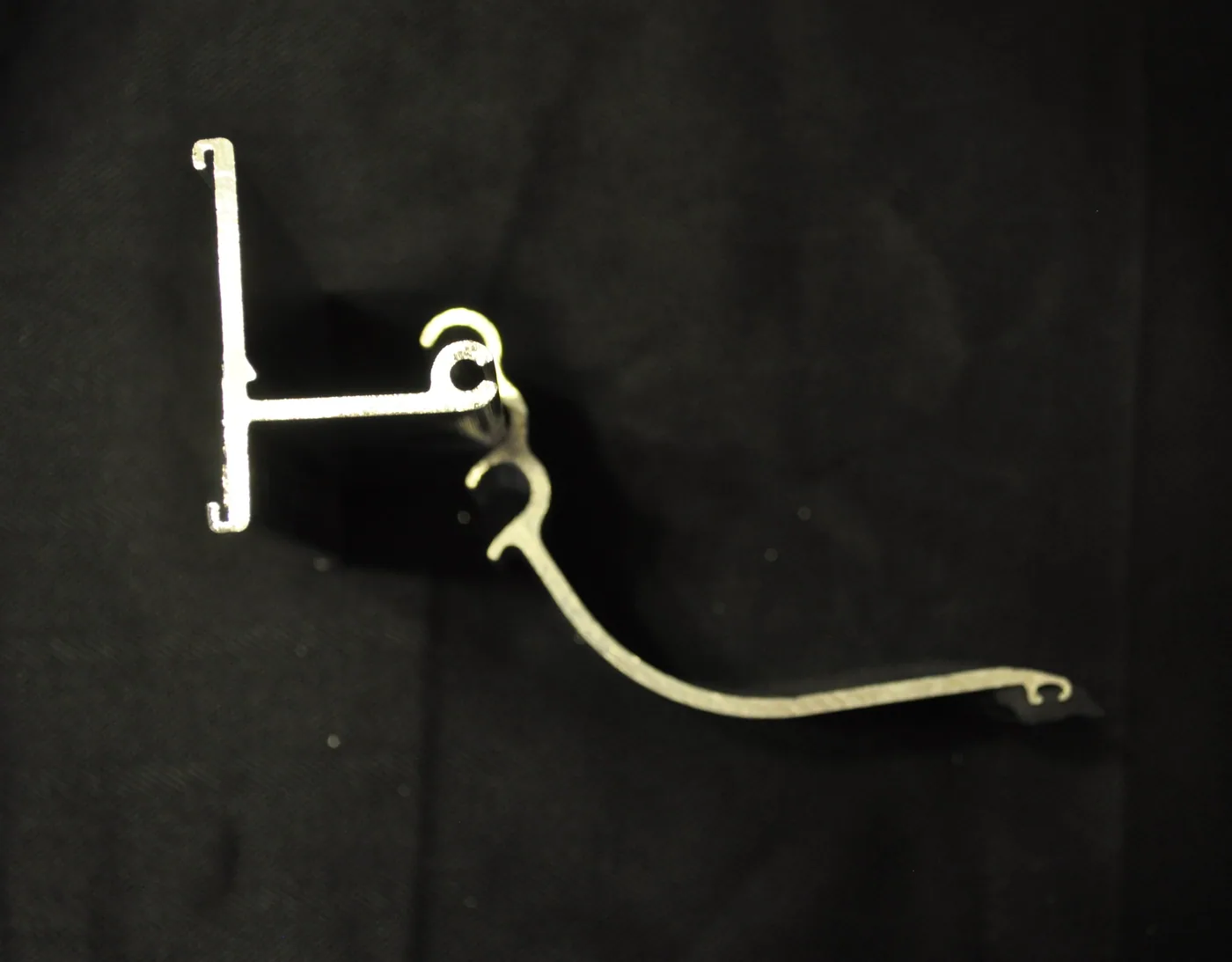 A non-mechanically attached Ice Stopper, as shown above, can blow or flip up and over the bar leaving the panel unprotected