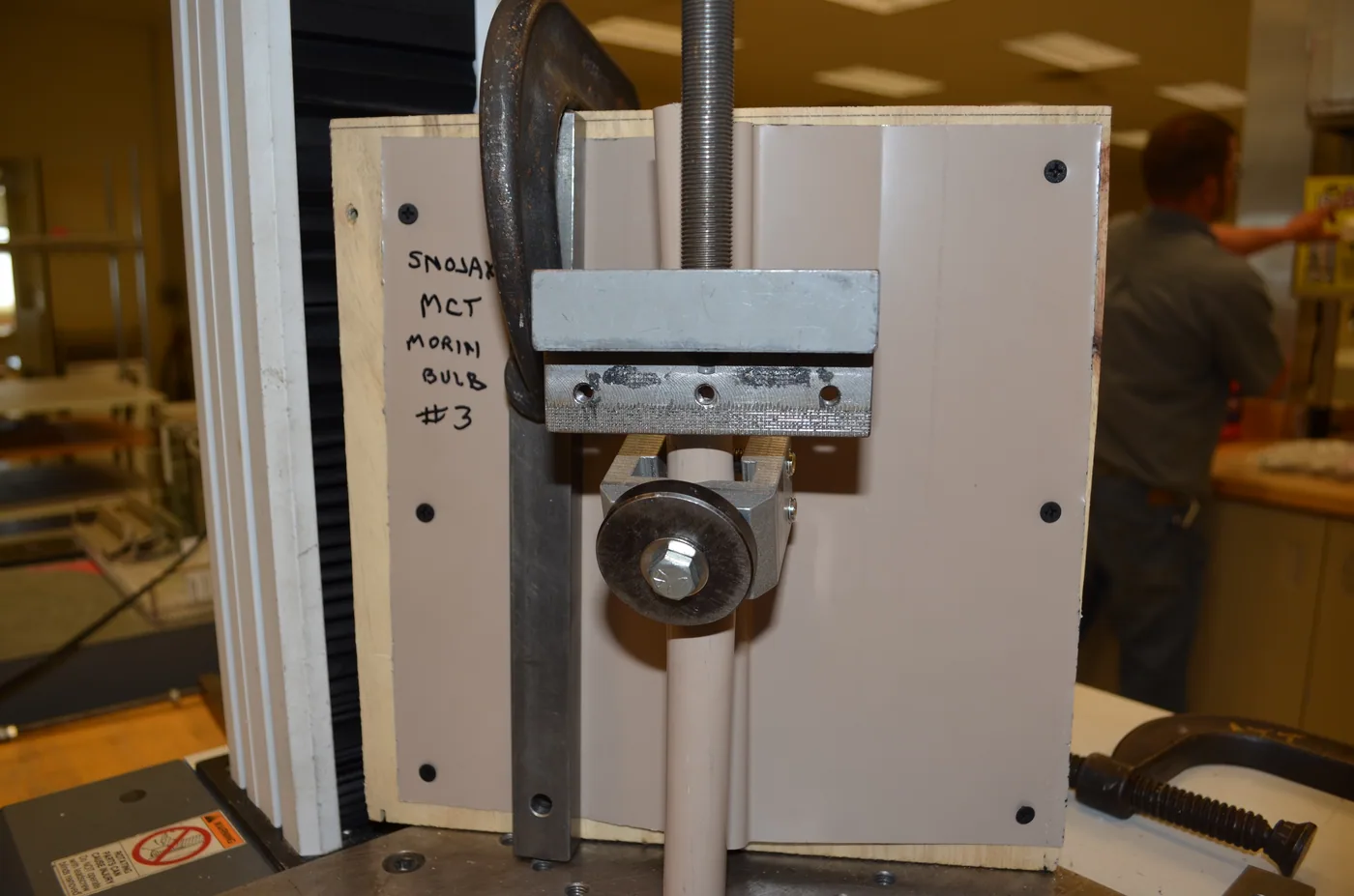 Professional clamp testing being performed at Architectural Testing, Inc
