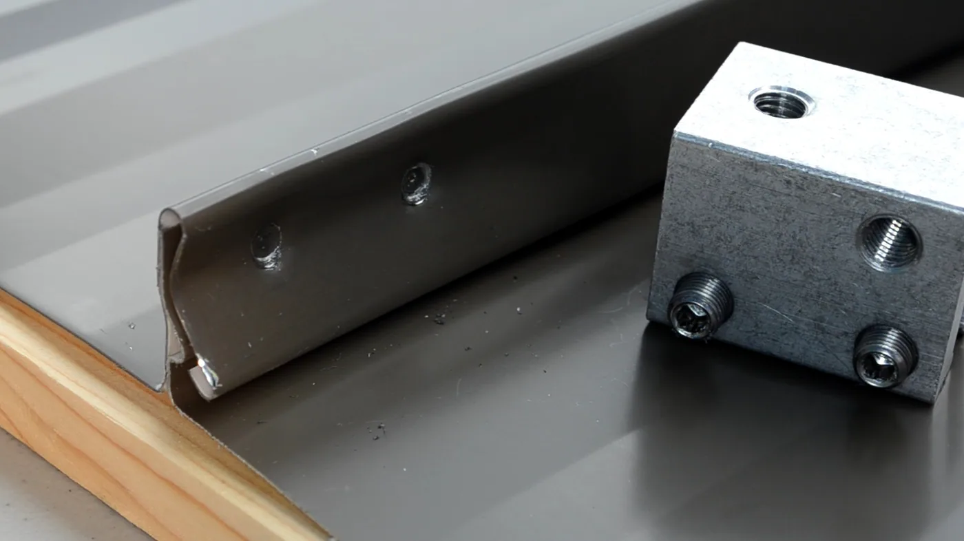 Alternate view of metal seam deformation from a round-point set screw test